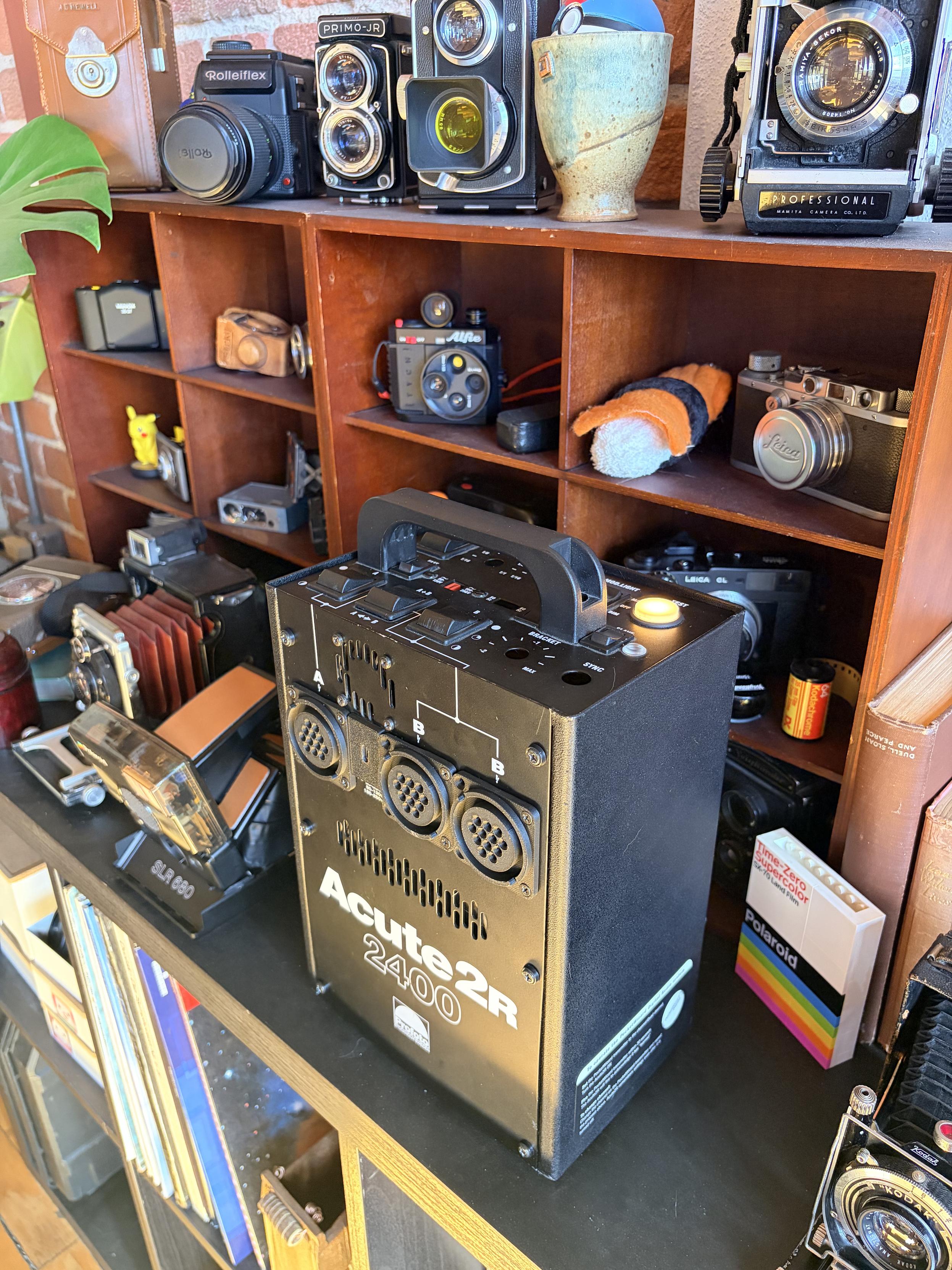 The Profoto speaker sitting on my shelf of old cameras, it very much looks the part