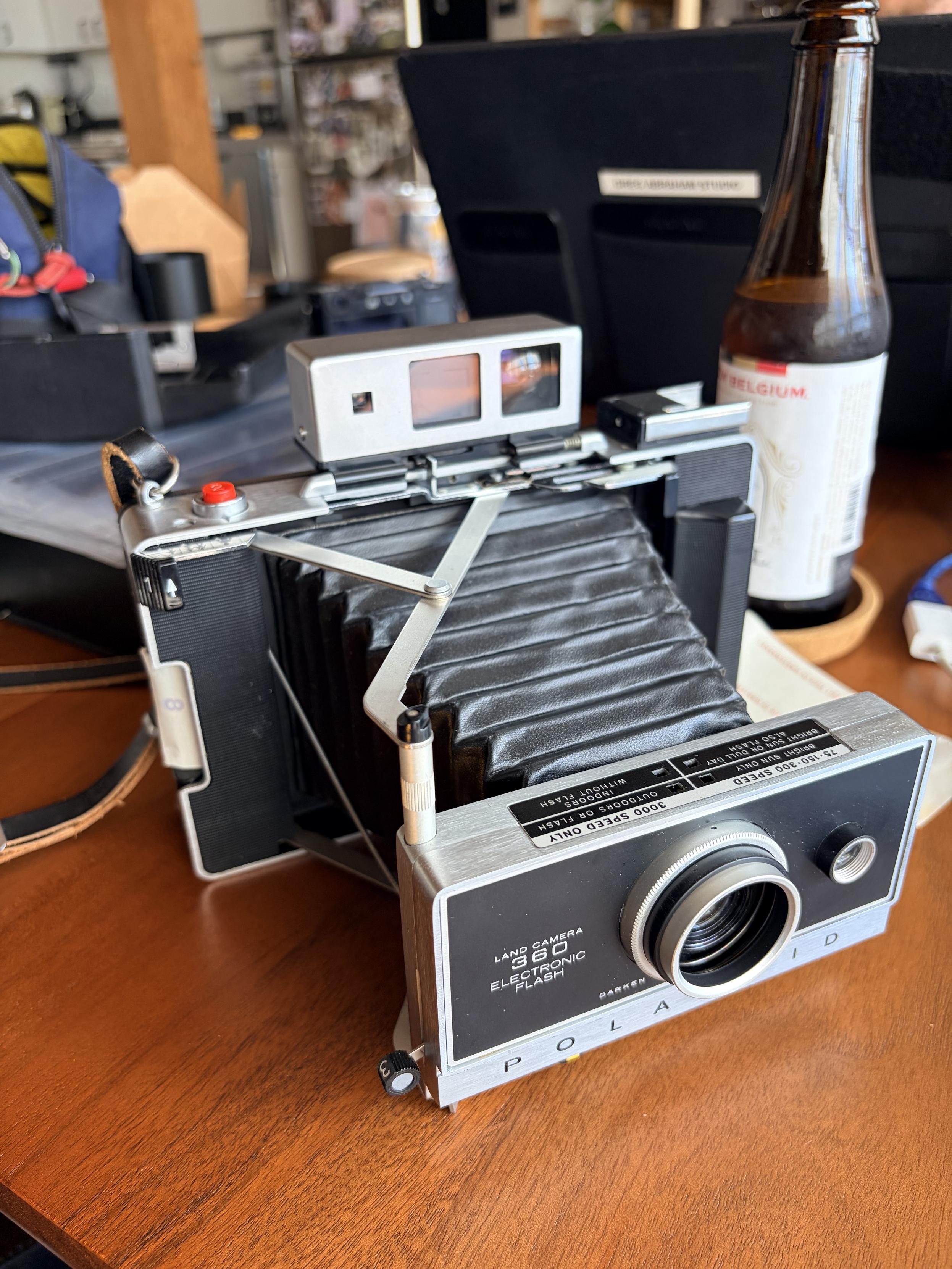 A classic Polaroid Land camera, a nice boxy camera with extending bellows